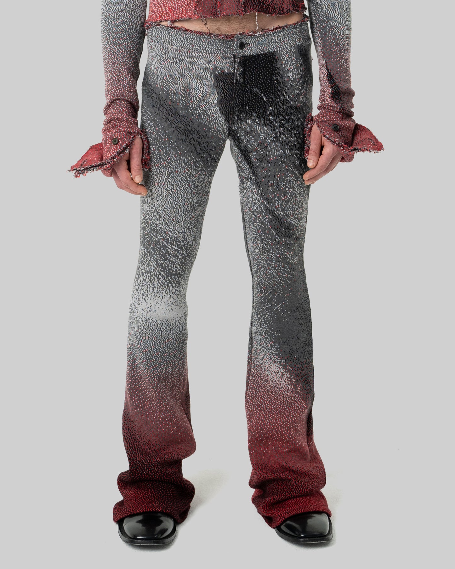 grey distressed knit trousers