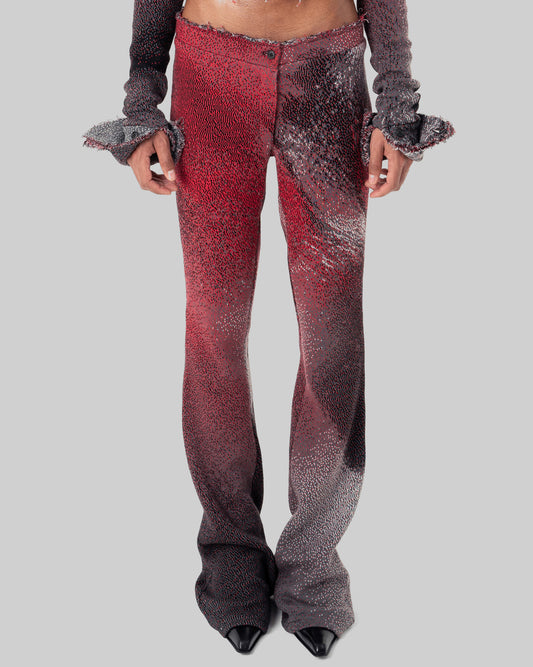 red distressed knit trousers